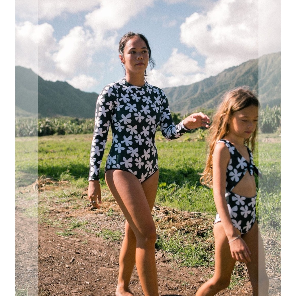 Of One Sea Women's Long Sleeve Zip Up in Black Plumeria
